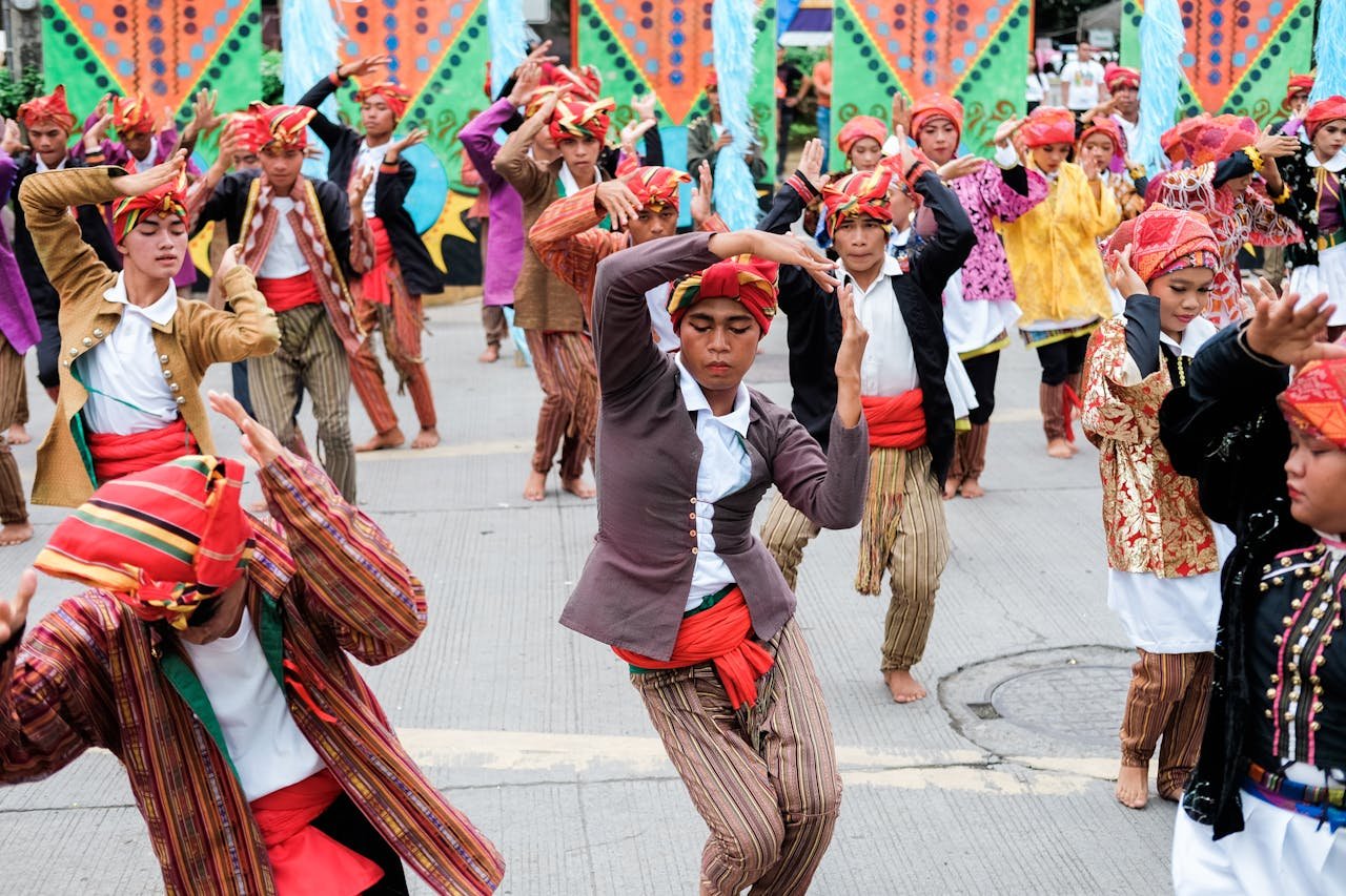 Vibrant street festival in Davao City showcasing traditional cultural dance and attire.